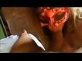 Masked MILF gives her lover some oral